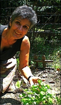 Ana Negron planting vegetables